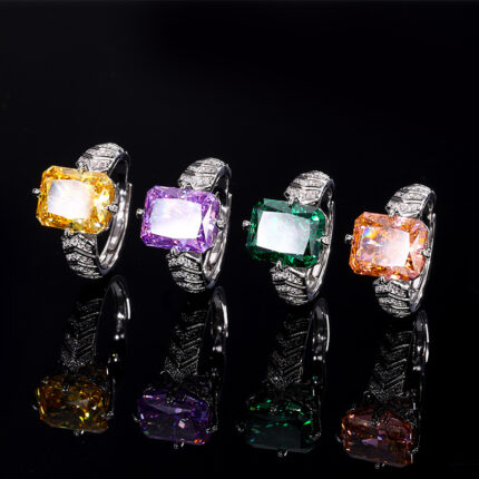 The cutting technology of colored gemstones is popular, with high carbon content, and the main component carbon element is the same as that of real diamonds. Highly simulated diamond Redion cutting ice flower cutting fat rectangular copper inlay temperament light luxury ring for women 10 * 12